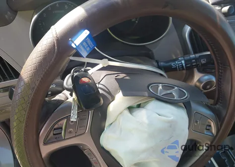 2012 Hyundai Tucson Limited z USA, uszkodzony, nr VIN KM8JU3ACXCU421378